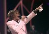 In this July 11, 1999, file photo, singer Whitney Houston performs "Until You Come Back To Me" during the 26th annual American Music Awards at the Shrine Auditorium in Los Angeles. 