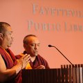 Geshe Thupten Dorjee, left, and Geshe Dakpa Topgyal chant Jan. 25 at the start of a lecture at the F...