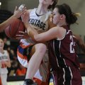 WHERE EAGLES DARE Ellen Lundy, Rogers Heritage, is fouled on Friday by Springdale High’s Sierra Dick...