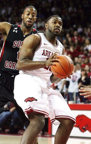 In his first extended playing time this season, Arkansas’ Brandon Mitchell, a backup quarterback on the Razorbacks football team, grabbed 4 rebounds and scored 8 points in 16 minutes.