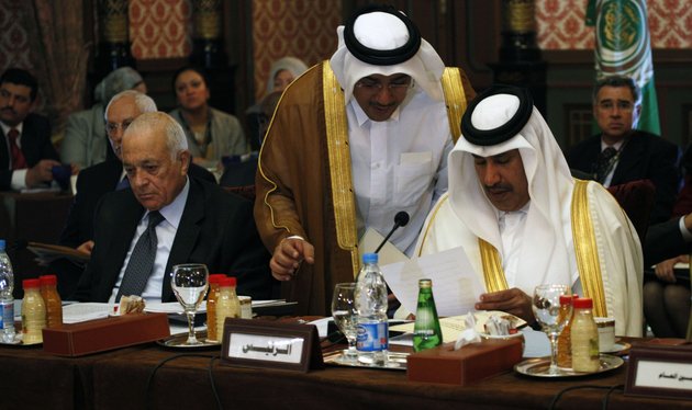 arab-league-chief-nabil-elaraby-left-and-qatari-prime-minister-sheikh-hamad-bin-jassim-althani-right-are-seen-during-a-meeting-in-cairo-egypt-sunday-feb-12-2012-the-arab-league-is-considering-a-proposal-sunday-to-revive-its-suspended-observer-mission-in-syria-by-expanding-it-to-include-monitors-from-non-arab-muslim-nations-and-the-united-nations-officials-from-the-22-member-group-said