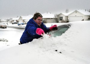 Snow, sleet sweep into Arkansas
