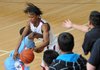 Fans react on Tuesday as Mytaah Crawford, right, of Springdale drives into Fort Smith Southside’s DQ Collins during the second quarter of the game at Springdale High.