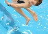 Parker Meinecke of Fayetteville competes in the final round of the Class 7A-West Diving competition Tuesday at the HPER Building on the University of Arkansas campus.