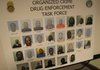 Defendants accused of involvement in a drug organization are pictured on a poster made available by the office of the U.S. Attorney for the Eastern District of Arkansas.
