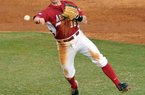 Arkansas Democrat-Gazette/MICHAEL WOODS --02/17/2012-- University of Arkansas shortstop Tim Carver throws to first base for an out in the fourth inning of Friday afternoon's opening game against Villanova at Baum Stadium in Fayetteville.