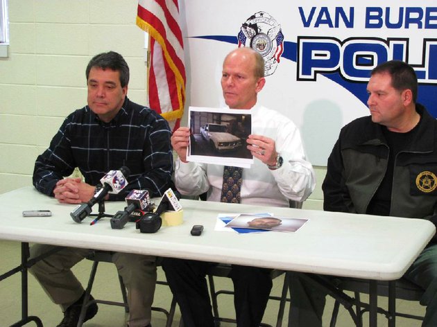 van-buren-police-chief-kenneth-bell-center-holds-up-a-picture-of-a-pickup-belonging-to-lloyd-jones-of-lavaca-a-registered-sex-offender-who-was-arrested-thursday-in-the-disappearance-of-16-year-old-angela-allen