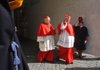 New Cardinal Timothy Dolan (right) of New York leaves St. Peter’s Basilica in Rome with fellow Cardinal Angelo Sodano after Saturday’s ceremony. 
