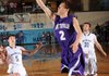 Cameron Paschke, Fayetteville senior guard, scores in the lane past the Har-Ber defense Feb. 17 during the first half at Wildcat Arena in Springdale.