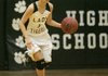 Arkansas Democrat-Gazette/RYAN MCGEENEY --02-10-2012-- Prairie Grove guard Michelle Lumsargis dribbles across the court during a Feb. 10 game against Farmington at Prairie Grove.