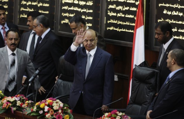 yemens-newly-elected-president-abed-rabbu-mansour-hadi-waves-as-he-arrives-to-the-parliament-in-sanaa-yemen-saturday-feb-25-2012-hadi-took-the-oath-of-office-before-the-countrys-parliament-saturday-he-replaces-ali-abdullah-saleh-who-ruled-the-country-for-33-years-before-leaving-office-in-a-power-transfer-deal-aimed-at-ending-more-than-a-year-of-political-turmoil