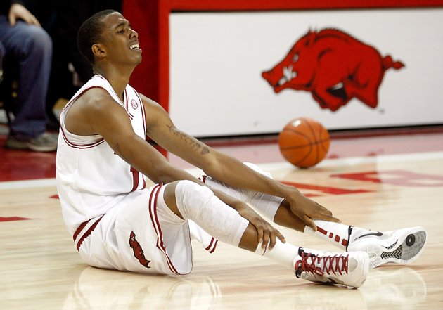 arkansas-democrat-gazettejason-ivester-022812-arkansas-freshman-bj-young-falls-to-the-floor-after-missing-a-game-tying-shot-at-the-buzzer-against-ole-miss-at-bud-walton-arena-in-fayetteville-on-tuesday-feb-28-2012