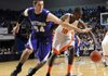 Fayetteville junior Tyler McCullough battles Little Rock Hall junior Bobby Portis for a loose ball in Friday’s Class 7A State Finals game in the Summit Arena in Hot Springs.