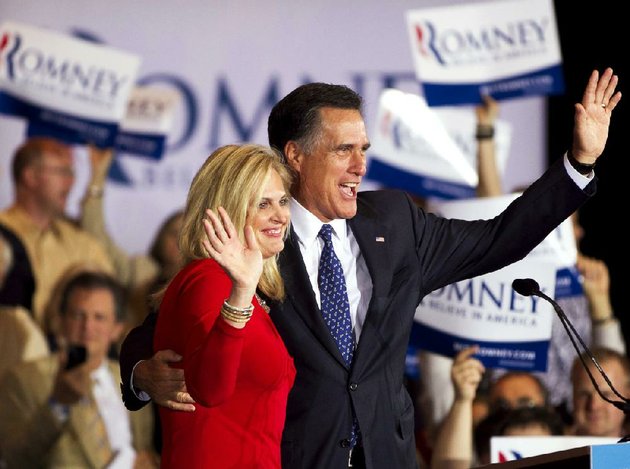 former-massachusetts-gov-mitt-romney-and-his-wife-ann-greet-a-crowd-tuesday-in-schaumburg-ill-after-romney-won-the-states-republican-presidential-primary