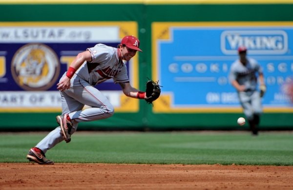 chris-daiglespecial-to-arkansasonline-4112-arkansas-second-baseman-bo-bigham-charges-the-ball-as-arkansas-takes-on-lsu-in-sundays-series-finale-lsu-swept-arkansas-with-a-3-2-win-in-11-innings