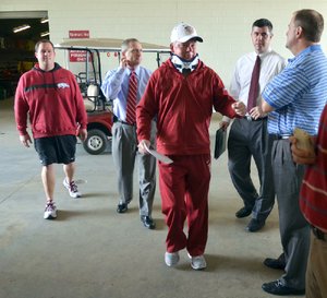 Arkansas Democrat-Gazette/MICHAEL WOODS  --03/31/2012-- University of Arkansas coach Bobby Petrino heads into a press conference to before practiceTuesday afternoon to answer questions about his motorcycle accident over the weekend.