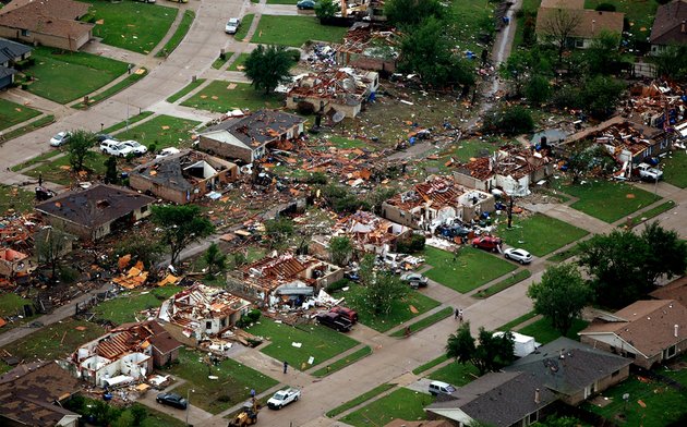 homes-in-lancaster-texas-lay-destroyed-by-a-tornado-on-tuesday-april-3-2012-tornadoes-tore-through-the-dallas-area-tuesday-peeling-roofs-off-homes-tossing-big-rig-trucks-into-the-air-and-leaving-flattened-tractor-trailers-strewn-along-highways-and-parking-lots-mags-out