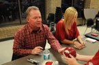 Head football Coach Bobby Petrino and Jessica Dorrell attended a fan event in Searcy on Feb. 23, 2012.