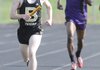 Jack Barry of Bentonville runs the 4x800-meter relay during the Panther Relays Thursday in Siloam Springs. 