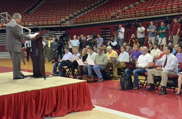university-of-arkansas-athletic-director-jeff-long-address-the-media-following-the-announcement-of-the-firing-of-football-coach-bobby-petrino-tuesday-evening-at-bud-walton-arena-in-fayetteville