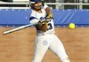 Ryan Vaughn of Rogers High connects for a two-run home run Tuesday during the Lady Mounties’ game against Fayetteville at Veterans Park in Rogers.
