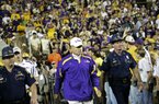 Louisiana State Police have been handling security on a volunteer basis for an LSU football coach since the late 1970s. 