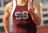 Damian Blossom of Siloam Springs sprints to the finish Thursday during the Joe Roberts Relays at Southwest Junior High School in Springdale.