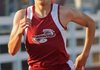 Demetrius Monaco of Springdale High competes in the 200-meter dash Thursday during the Joe Roberts Relays at Southwest Junior High School in Springdale.