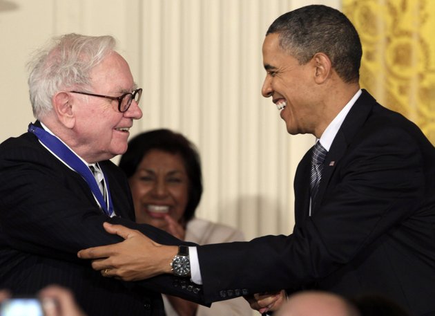 in-this-feb-15-2010-file-photo-president-barack-obama-congratulates-warren-buffett-after-presenting-him-with-a-2010-presidential-medal-of-freedom-in-an-east-room-ceremony-at-the-white-house-in-washington-in-his-weekly-radio-and-internet-address-saturday-april-14-2012-obama-urged-americans-to-ask-their-member-of-congress-to-support-the-buffett-rule-named-after-the-billionaire-investor-who-says-he-pays-a-lower-tax-rate-than-his-secretary-obama-says-the-nation-cant-afford-to-keep-giving-tax-cuts-to-the-wealthiest-who-dont-need-them-and-didnt-even-ask-for-them