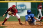 Kentucky’s Luke Maile (21) steals second base while Arkansas second baseman Bo Bigham waits for a late throw from home plate during the Wildcats’ 5-4 victory Saturday in the first game of a doubleheader at Baum Stadium in Fayetteville. 