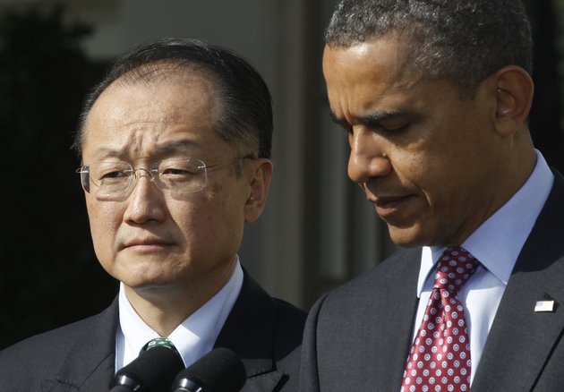 president-barack-obama-stands-with-jim-yong-kim-his-nominee-to-be-the-next-world-bank-president-in-the-rose-garden-of-the-white-house-in-washington-friday-march-23-2012-kim-is-currently-the-president-of-dartmouth-college