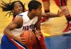 Parkview's Anton Beard drives the ball around Clarksville's Kendrick Lee during the Jammin' for Jackets basketball tournament at North Little Rock High School.
