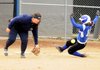 Kylan Hensley, right, Lady Mounties makes it safely to third base after an error by the Lady War Eagles’ Michelle Edmiston on Friday at Veterans Park in Rogers.