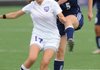 Lindsay Will, right, Springdale Har-Ber sophomore defender, sends the ball past Fayetteville junior forward Taylor Ward on Friday during the first half of play at Harmon Field in Fayetteville. 