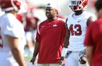Arkansas acting head coach Taver Johnson led the team by running through the A on Saturday, which was an experience he says he will never forget. 