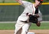 Hunter Wood of Rogers Heritage pitches Thursday during game one of two against Bentonville at Veterans Park in Rogers. 