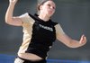 Michelle Biittner of Bentonville competes in the girl’s shot put Thursday during the 7A-West Conference track meet at Mountie Stadium in Rogers.