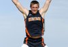 Alex Miles of Rogers Heritage competes Thursday in the boy’s long jump final. Miles took first place in the event. 