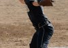 Kali Piha of Bentonville pitches Friday during the game against Rogers High.