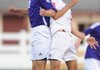 Tyler Ho, left, a Fayetteville senior, and Springdale’s Nestor Barroso collide while leaping to redirect the ball Friday during the first half at Jarrell Williams Bulldog Stadium in Springdale.