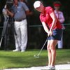 Lewis retains lead with birdie spree