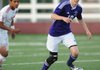 Ryan Starr, a Fayetteville junior forward, sends the ball upfield Friday during the first half against Springdale at Jarrell Williams Bulldog Stadium in Springdale. 