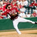 Arkansas Democrat-Gazette/WILLIAM MOORE -- Arkansas third baseman Matt Reynolds hit a two-run pinch-...