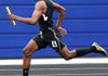Little Rock Central’s Xavier Ashford sprints to the finish line in the 400 meter relay Thursday at Mountie Stadium in Rogers.