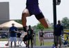 Sydney Conley of Fayetteville competes in the long jump Thursday at Mountie Stadium in Rogers for the Class 7A State Track meet. Conley won the event with a jump of 19 feet 9 inches.