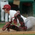 Arkansas Democrat-Gazette/RYAN MCGEENEY --05-04-2012-- Razorbacks 3rd baseman Matt Reynolds slides s...