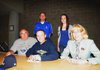 Orin Orlopp, center, will play baseball for Lyon College. With him at a signing ceremony Tuesday are, from left, his father, Craig Orlopp, Rogers baseball coach Matt Melson, sister, Sharon Orlopp, and mother, Sharon Orlopp.