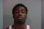 Arkansas football players Maudrecus Humphrey (left), Marquel Wade (center) and Andrew Peterson (right) were arrested by UAPD on May 12 and charged with residential burglary. 