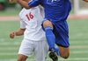 Rogers’ Wilson Valdez, right, collides with Springdale sophomore Enrique Martinez while redirecting the ball Friday during the first half of play at Northside High School in Fort Smith. Go to photos.nwaonline.com to see more photos.
