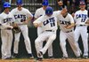 Arkansas Democrat-Gazette/BENJAMIN KRAIN --5/11/12-- Conway's Tyler Langley, right, is greeted by cheering teammates at homeplate after scoring the tieing run in the 6th inning during the Class 7A baseball state tournament against Springdale Har-Ber Friday at Burns Park in North Little Rock.